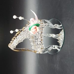 Hand made spun glass piano on a mirror base.